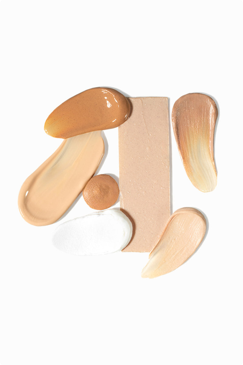 Swatch image of all of our Facial Sunscreens, including Flawless Complexion Lightly & Richly Tinted, Prime & Protect Tinted and Non-Tinted, Face Moisture, Mineral Sun Stick, and Lip Balm in a group on a white background