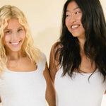 Image of two models side hugging each other